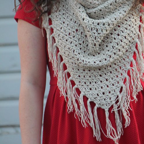 Young lady wearing red dress and the Amarillo crochet cowl.